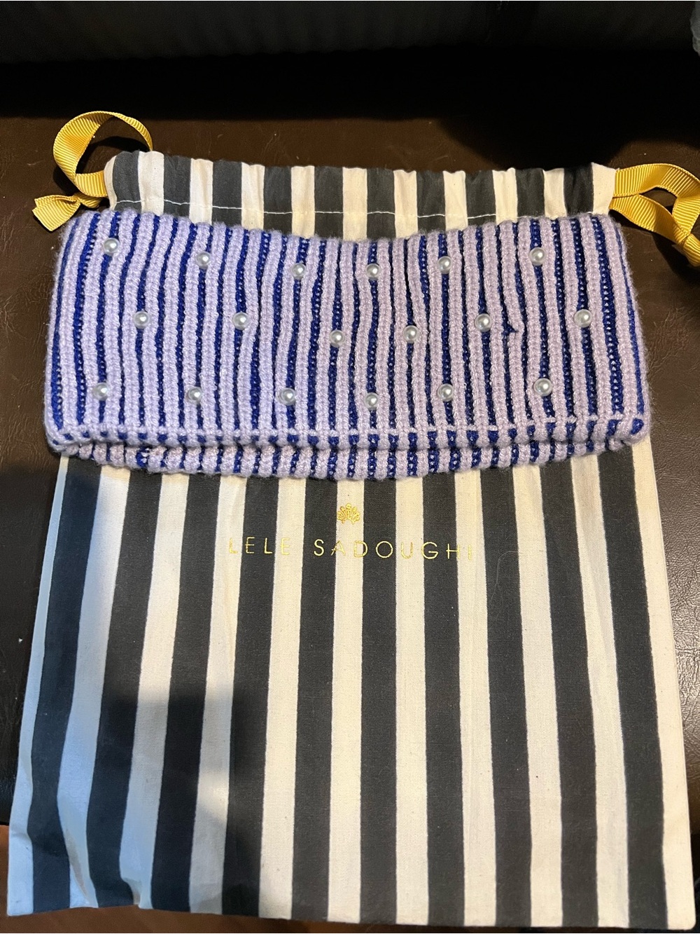 Lele Sadoughi Embellished Stripe ribbed ear warmer in “Sunday Stripe” color-way.